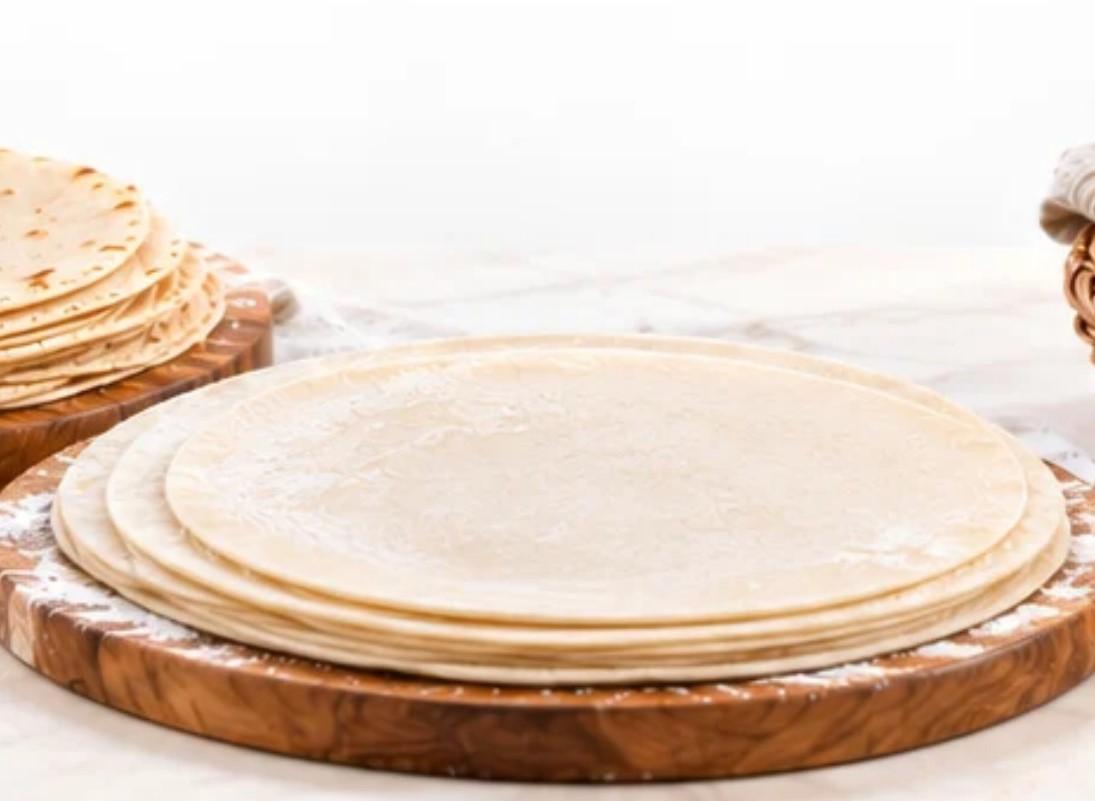 Roti / chapati pressing machine